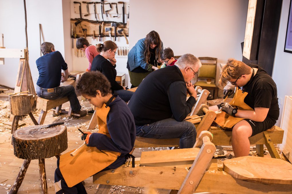A children’s spoon carving workshop underway at the Rekindle workshop, at Te Matatiki Toi Ora Arts Centre, Christchurch. Image: Johannes van Kan.